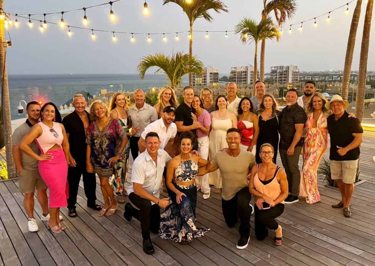 Relaxed group gathering at Soulfit Retreat rooftop in Miami.
